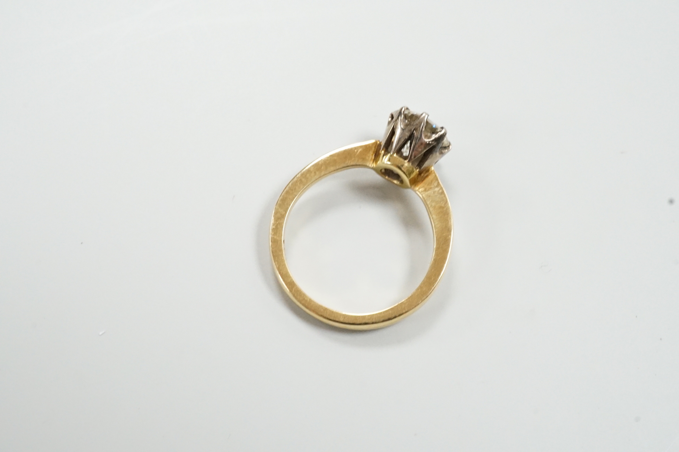 A yellow metal and solitaire diamond set ring, size K/L, gross weight 3.3 grams